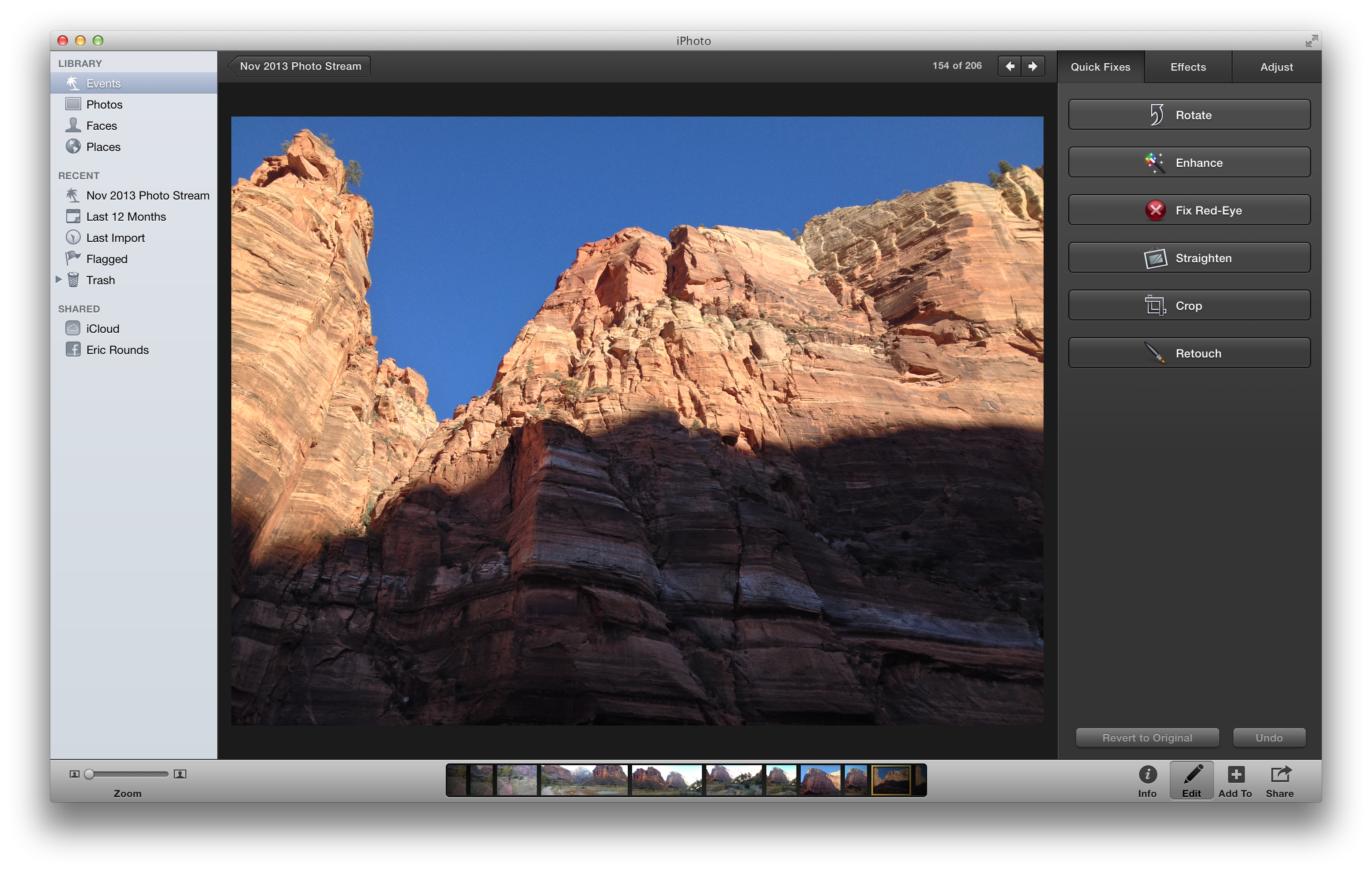 iPhoto screen showing photo editing tools and landscape image
